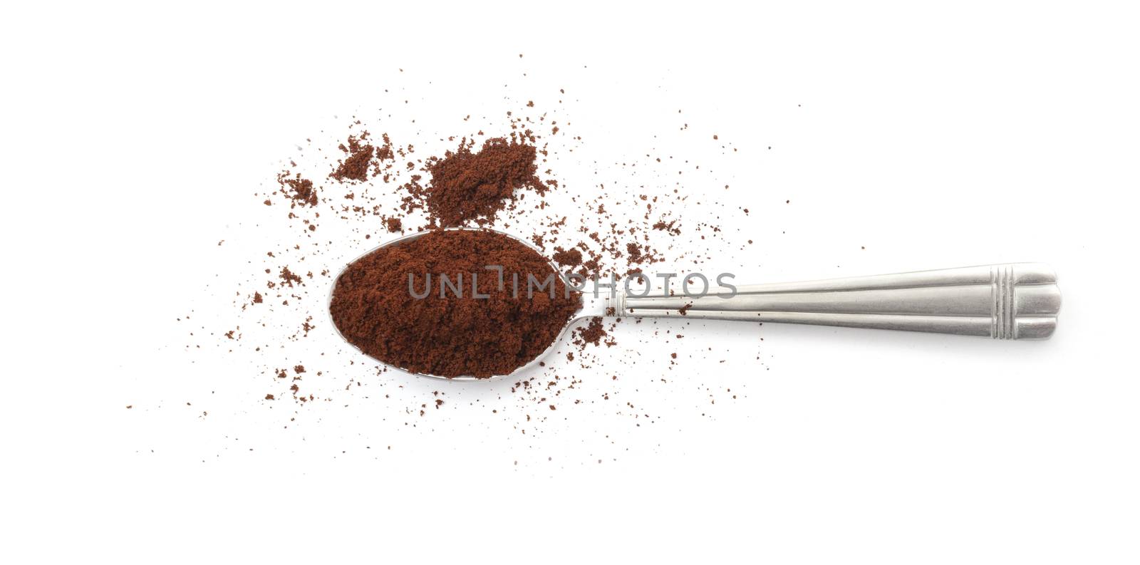 Сoffee powder on spoon isolated on white by SlayCer
