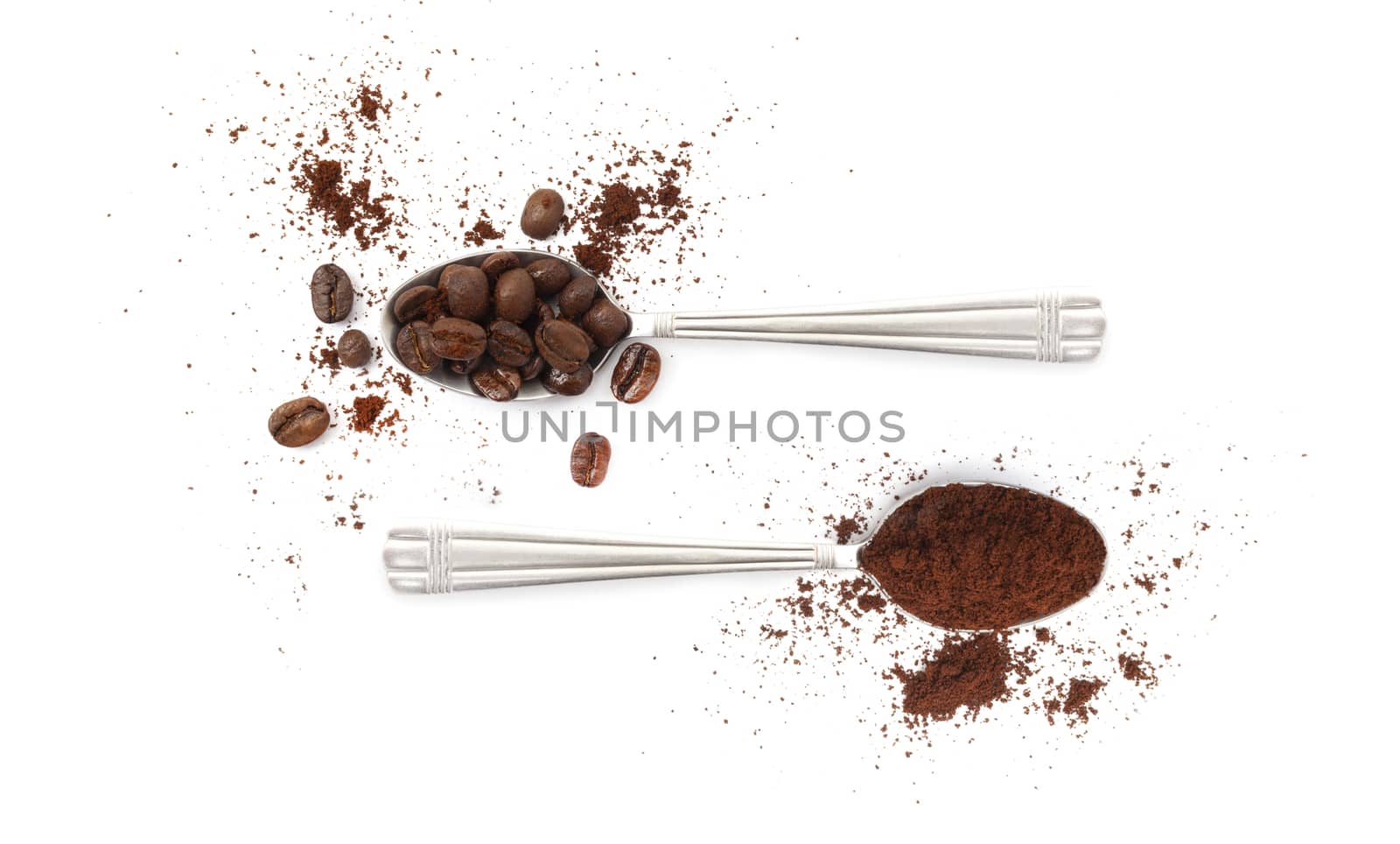 Spoons with coffee beans and coffee powder isolated on white background.