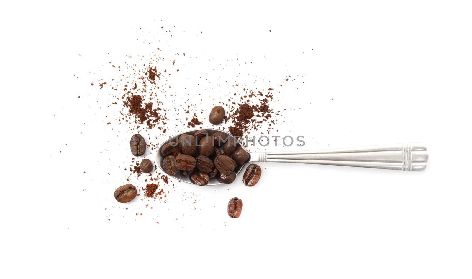 Spoon with coffee beans isolated on white background.