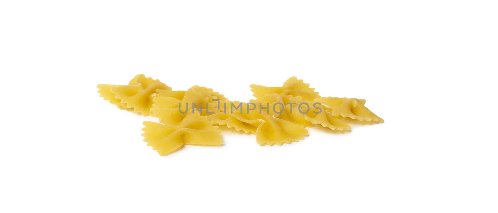 Farfalle pasta isolated on white background by SlayCer