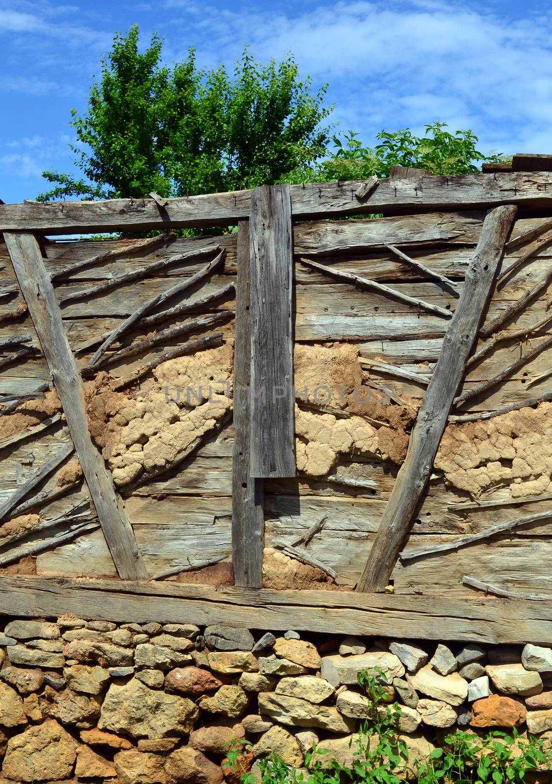 Old house wall built with traditional building materials