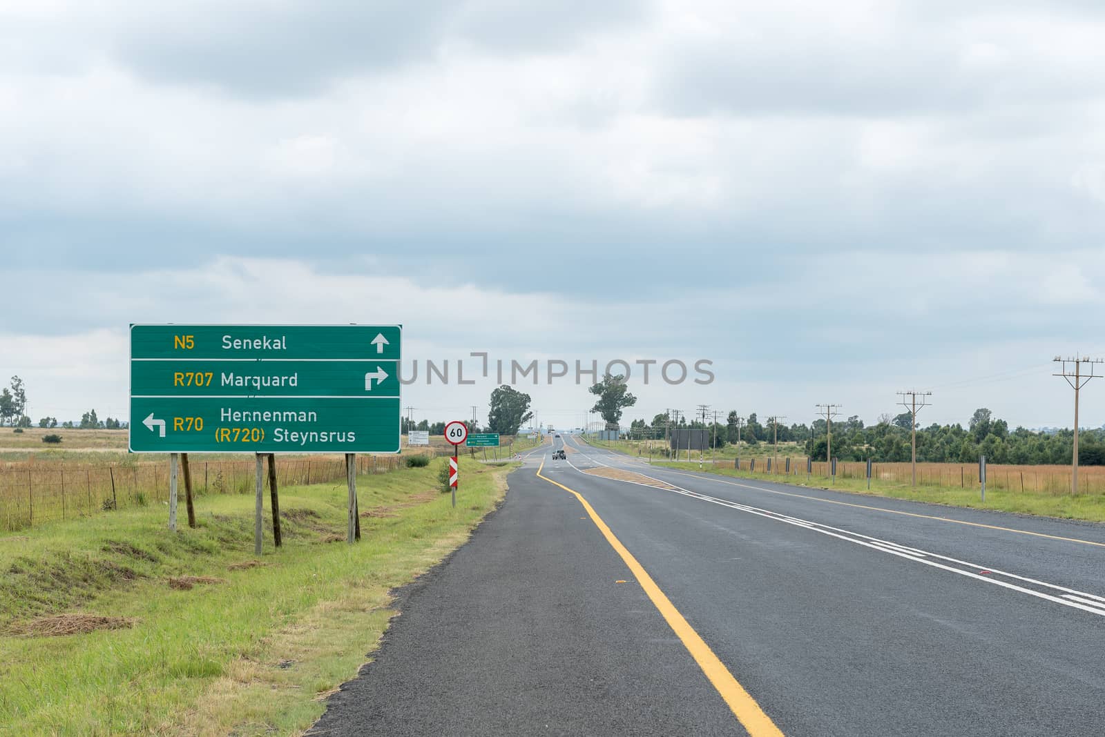 Directional and speed road signs on road N5 near Senekal in the Free State Province