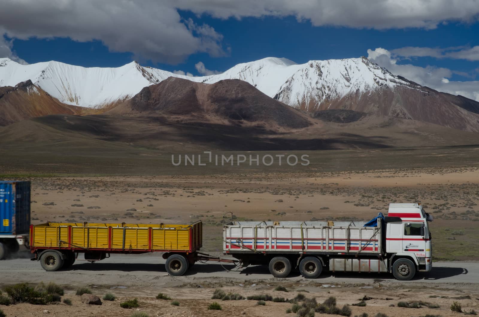 Truck with a trailer in Lauca National Park. by VictorSuarez