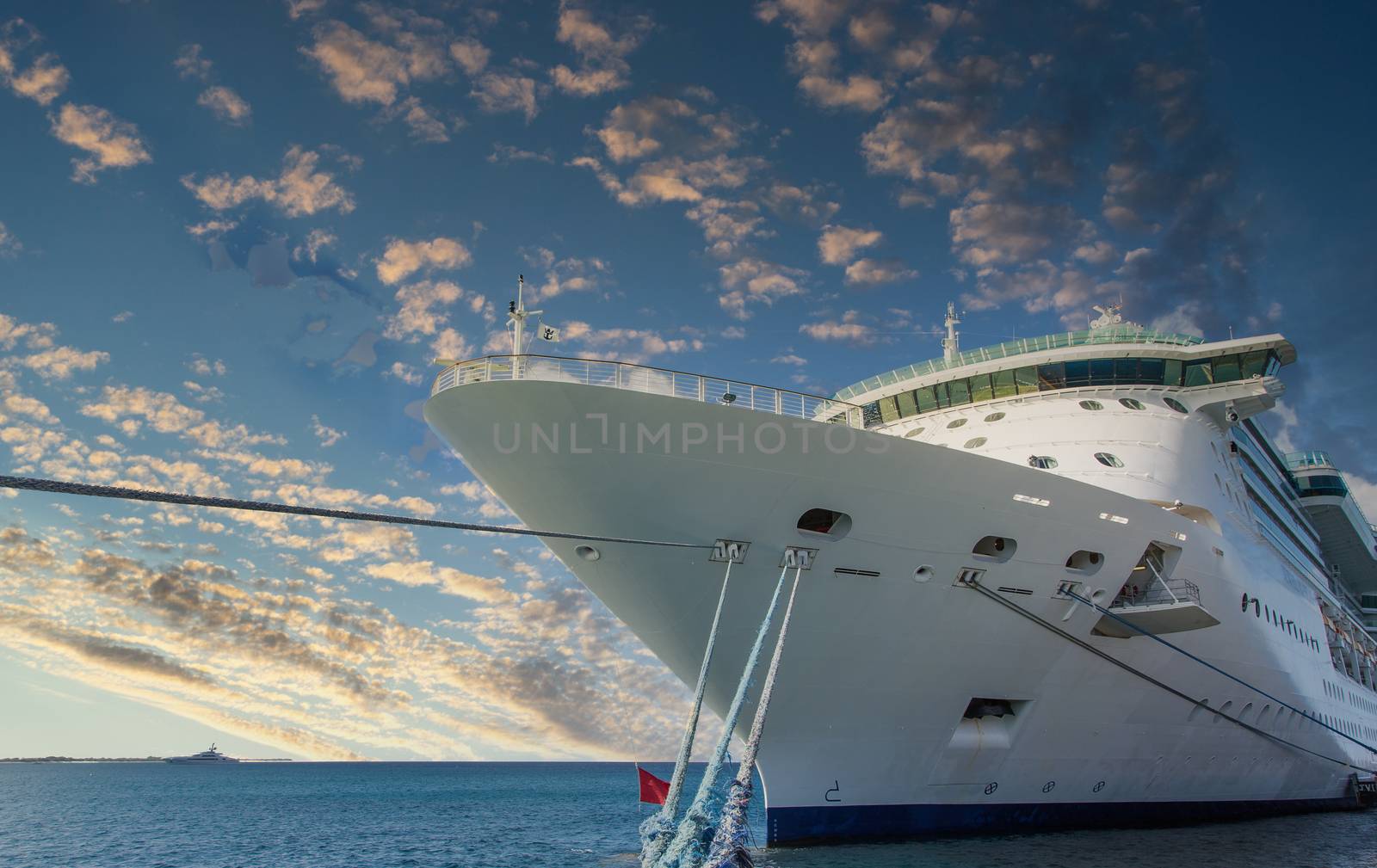 Bow of Cruise Ship and Ropes to Pier by dbvirago