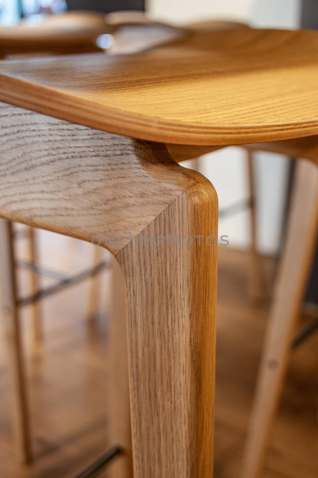 close up of wood work of a chair and table