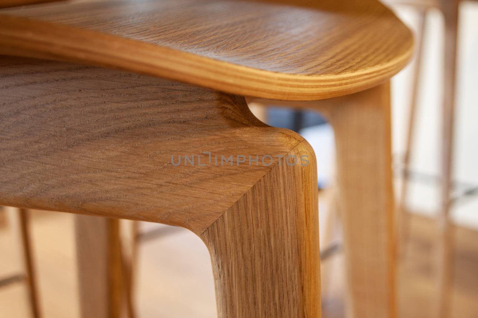 close up of wood work of a chair and table