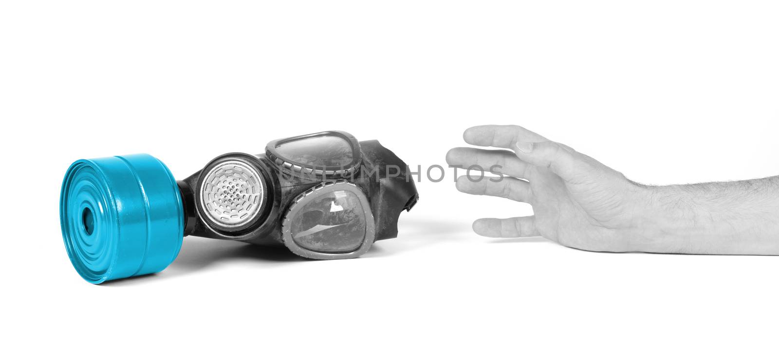 Arm reaching for vintage gasmask isolated on a white background - Blue filter