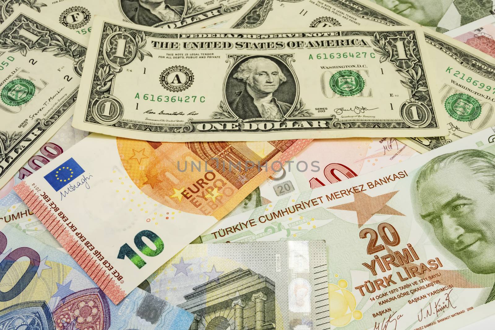 close up turkish lira, american dollar and euro banknotes on background