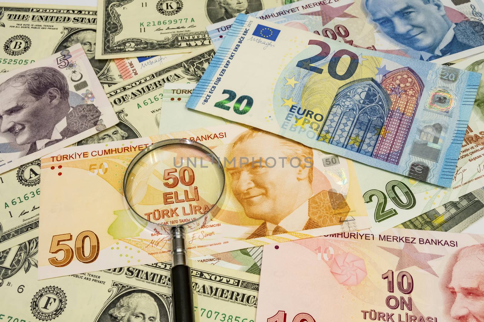 close up turkish lira, american dollar and euro banknotes on background