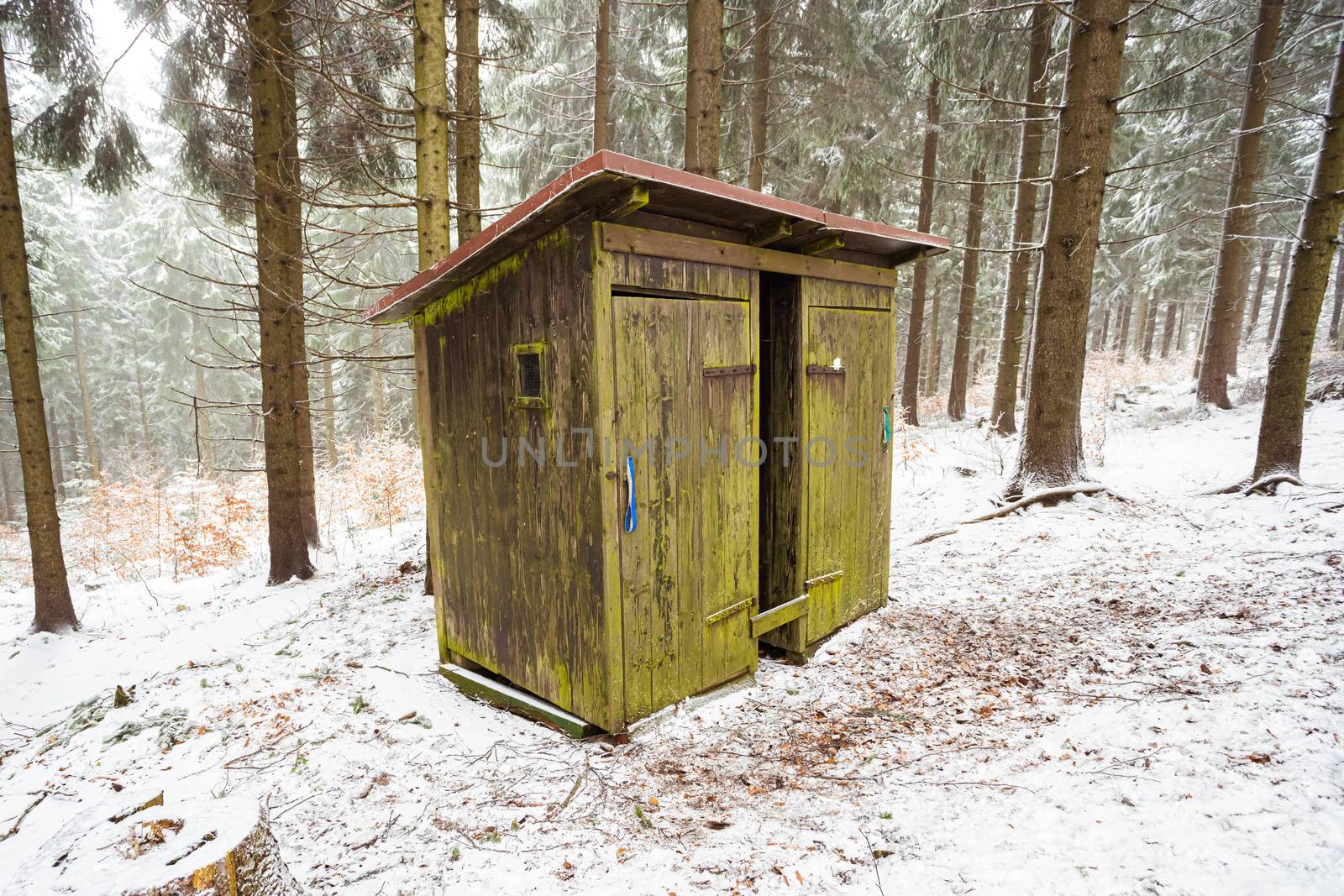 Wood cabin in the woods snow covered in winter by petrsvoboda91