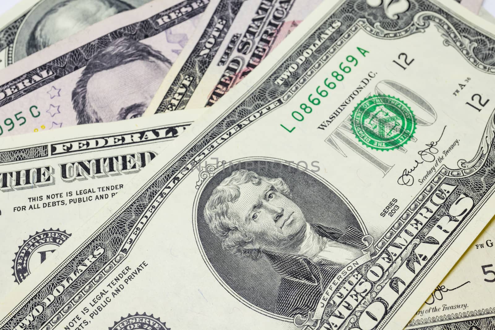 close up US dollar banknotes on background.
