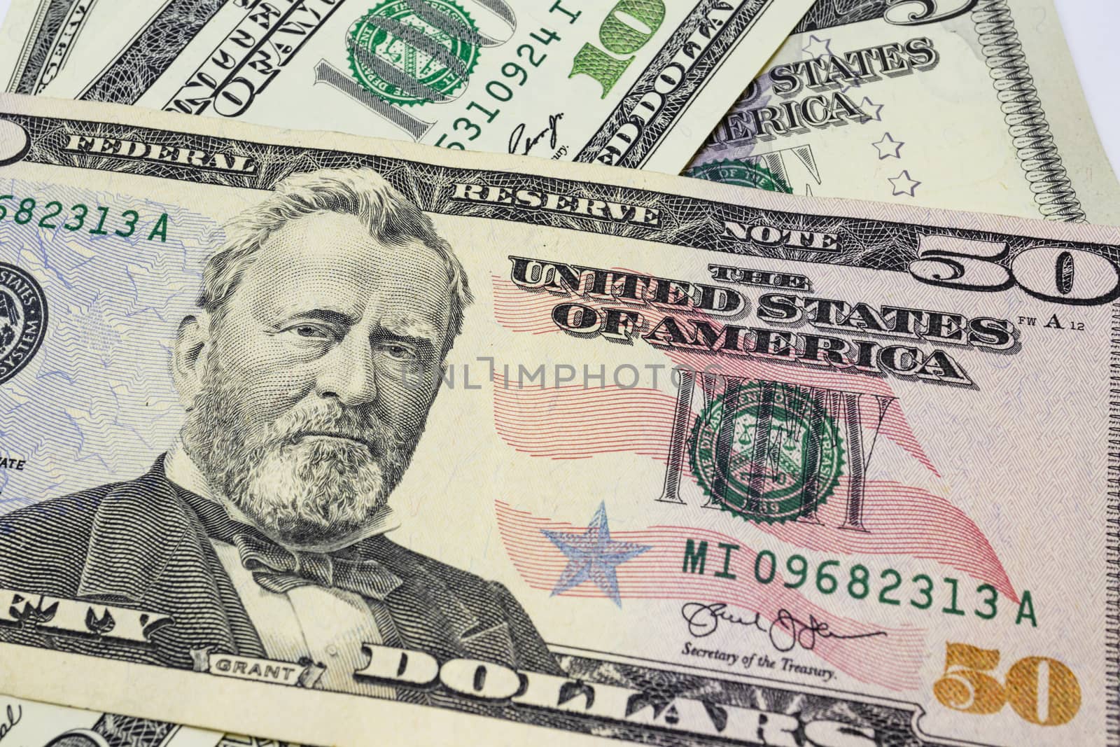 close up US dollar banknotes on background.