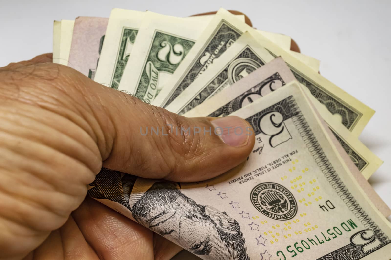 close up US dollar banknotes on background.