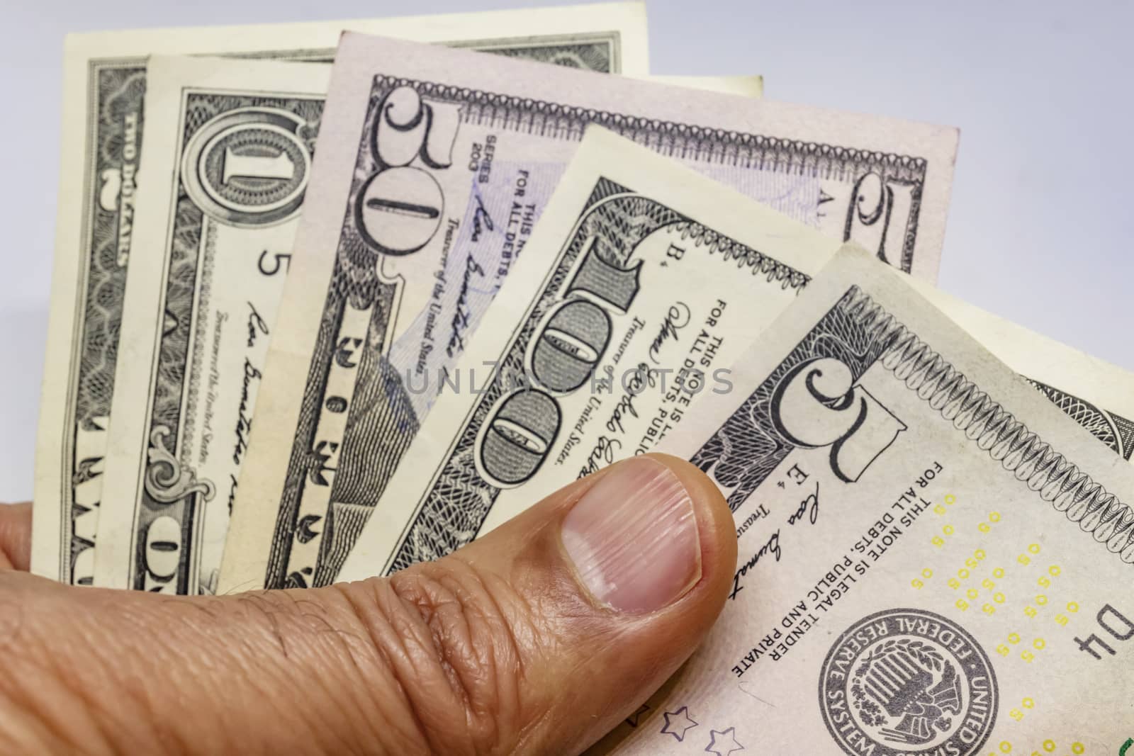 close up US dollar banknotes on background.