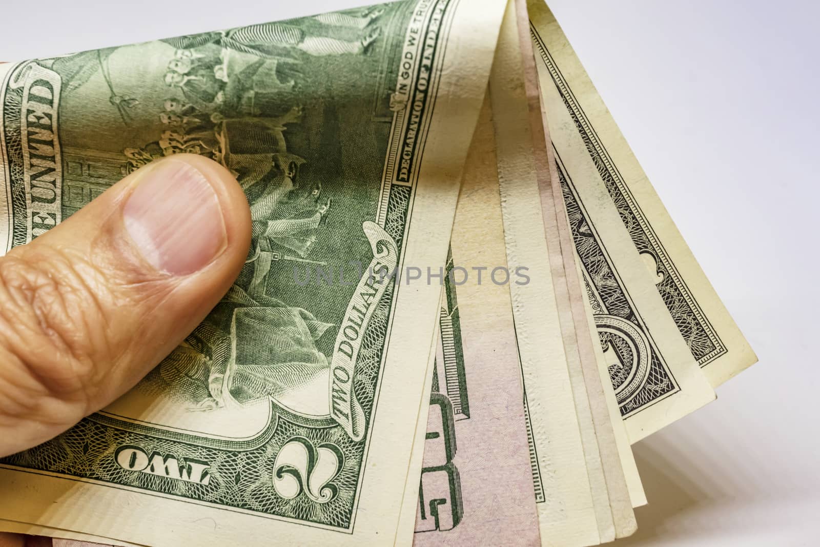 close up US dollar banknotes on background.