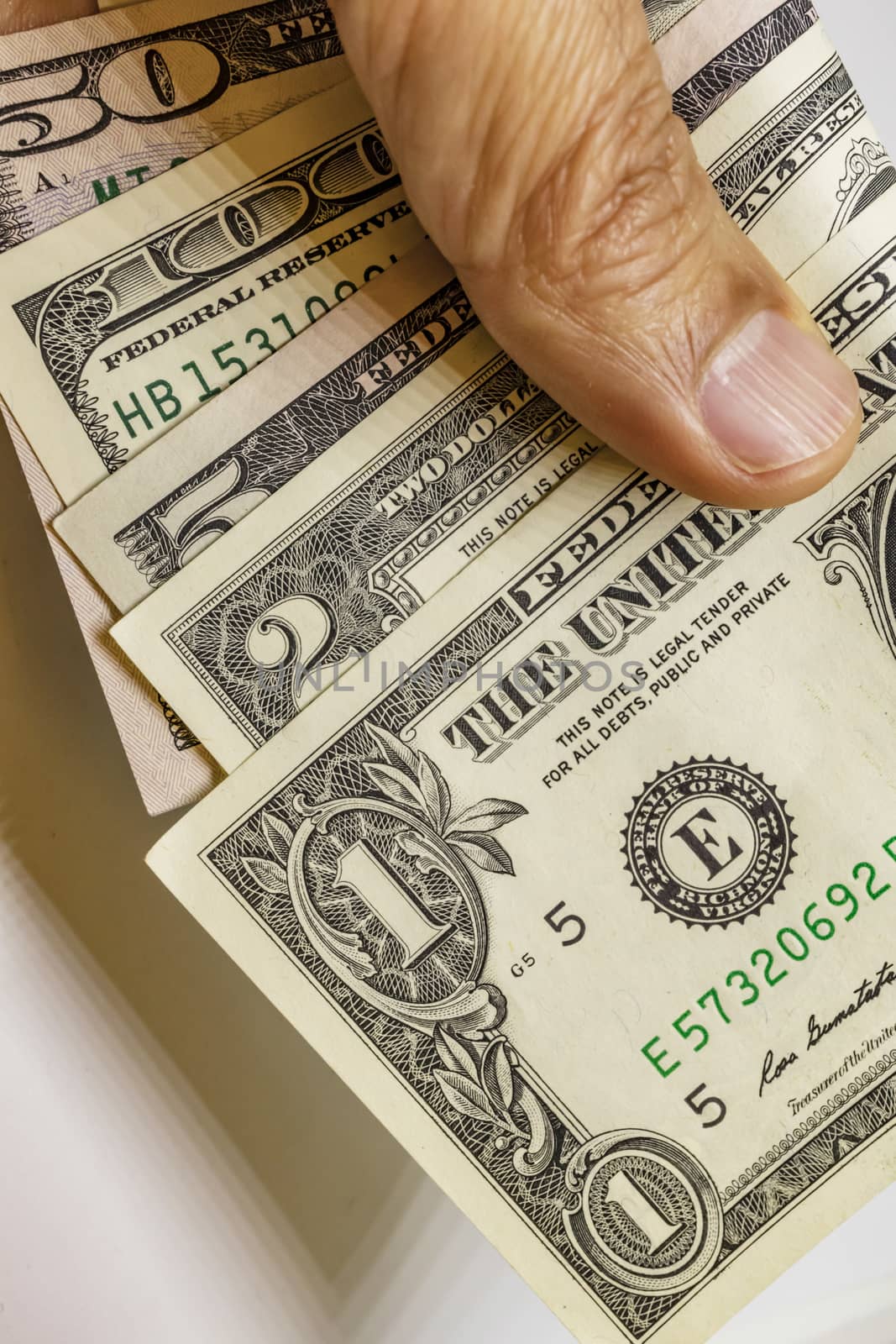 close up US dollar banknotes on background.