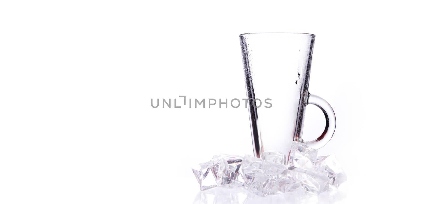 glass of fresh clear water with ice on white background