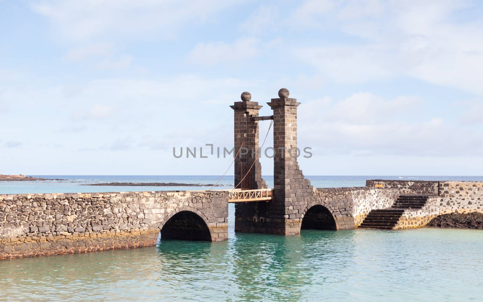 Puente de las Bolas leads to San Gabriel Castle in the port city of Arrecife on the Spanish island of Lanzarote.