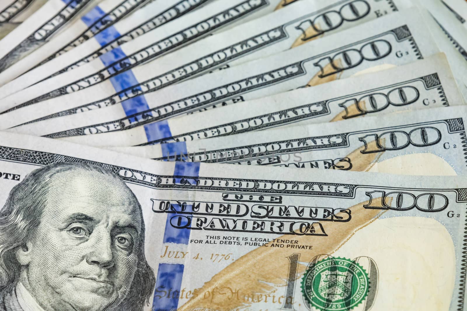 close up US dollar banknotes on background.