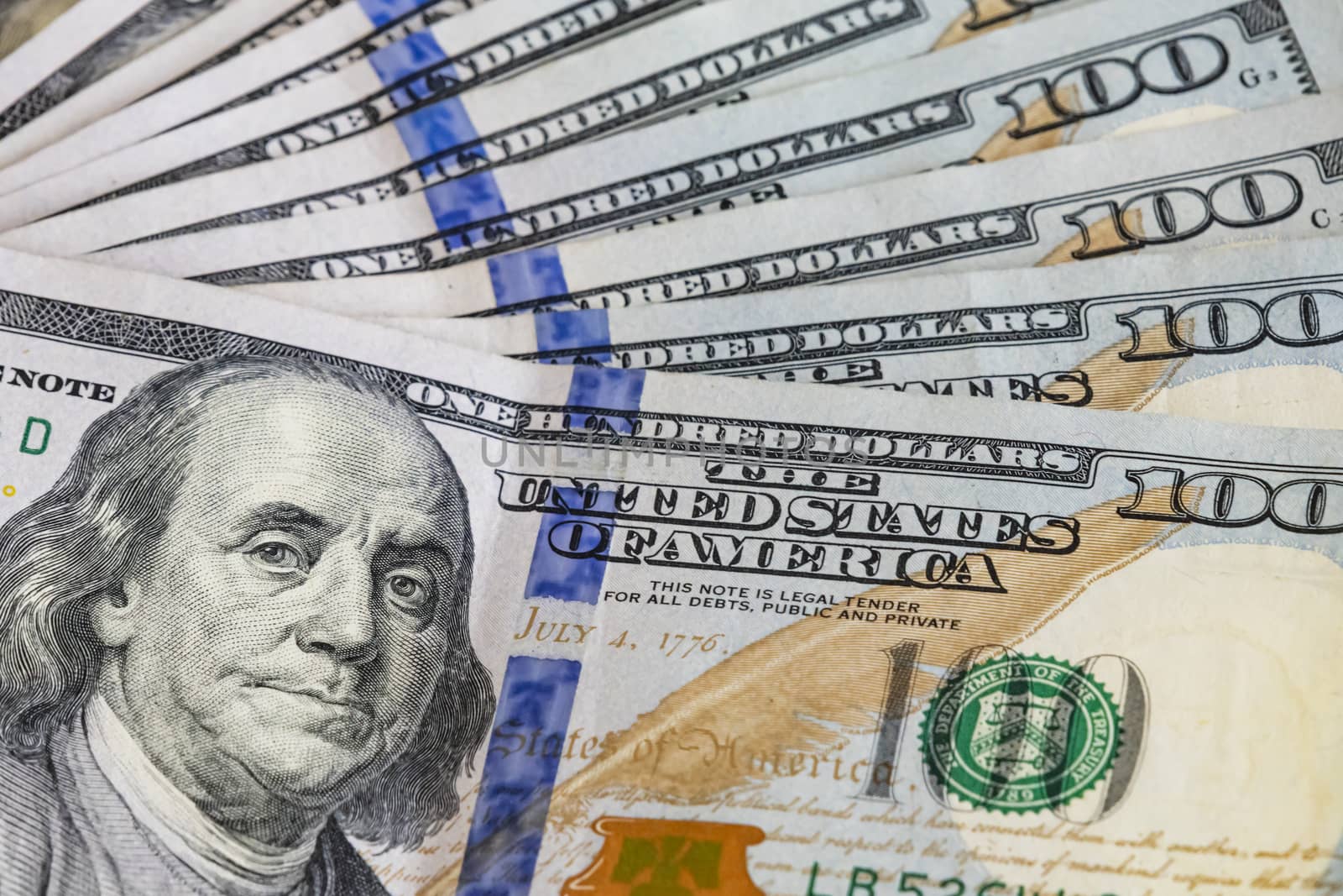 close up US dollar banknotes on background.