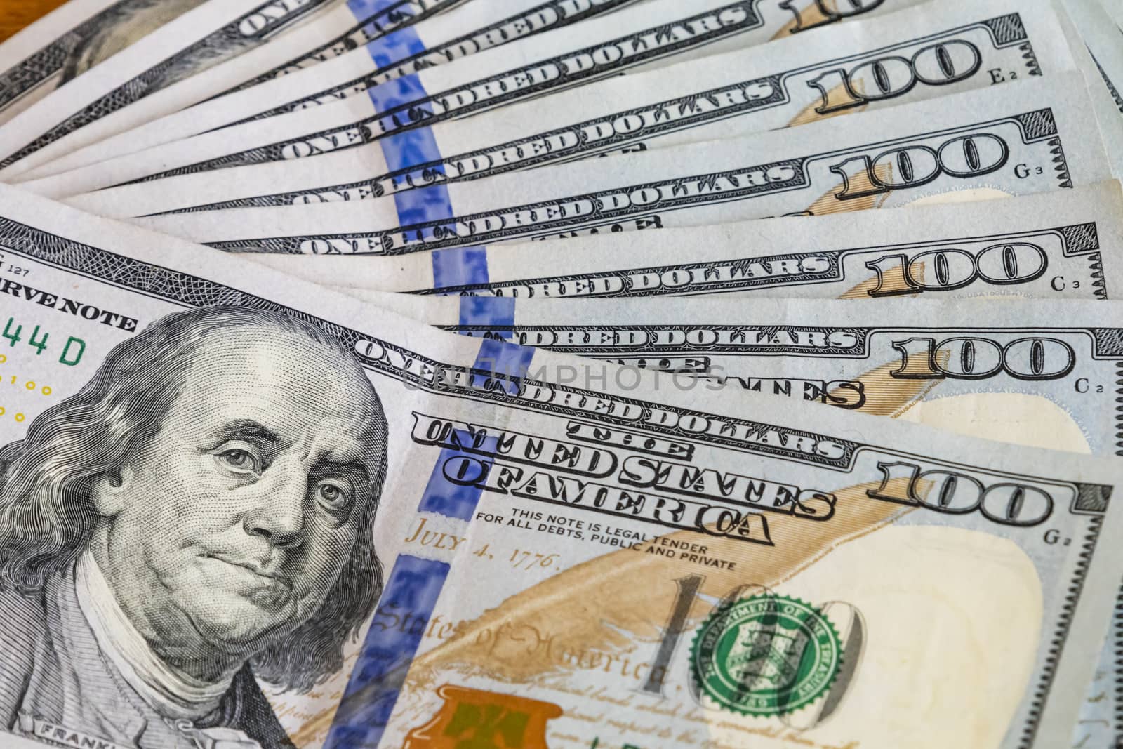 close up US dollar banknotes on background.