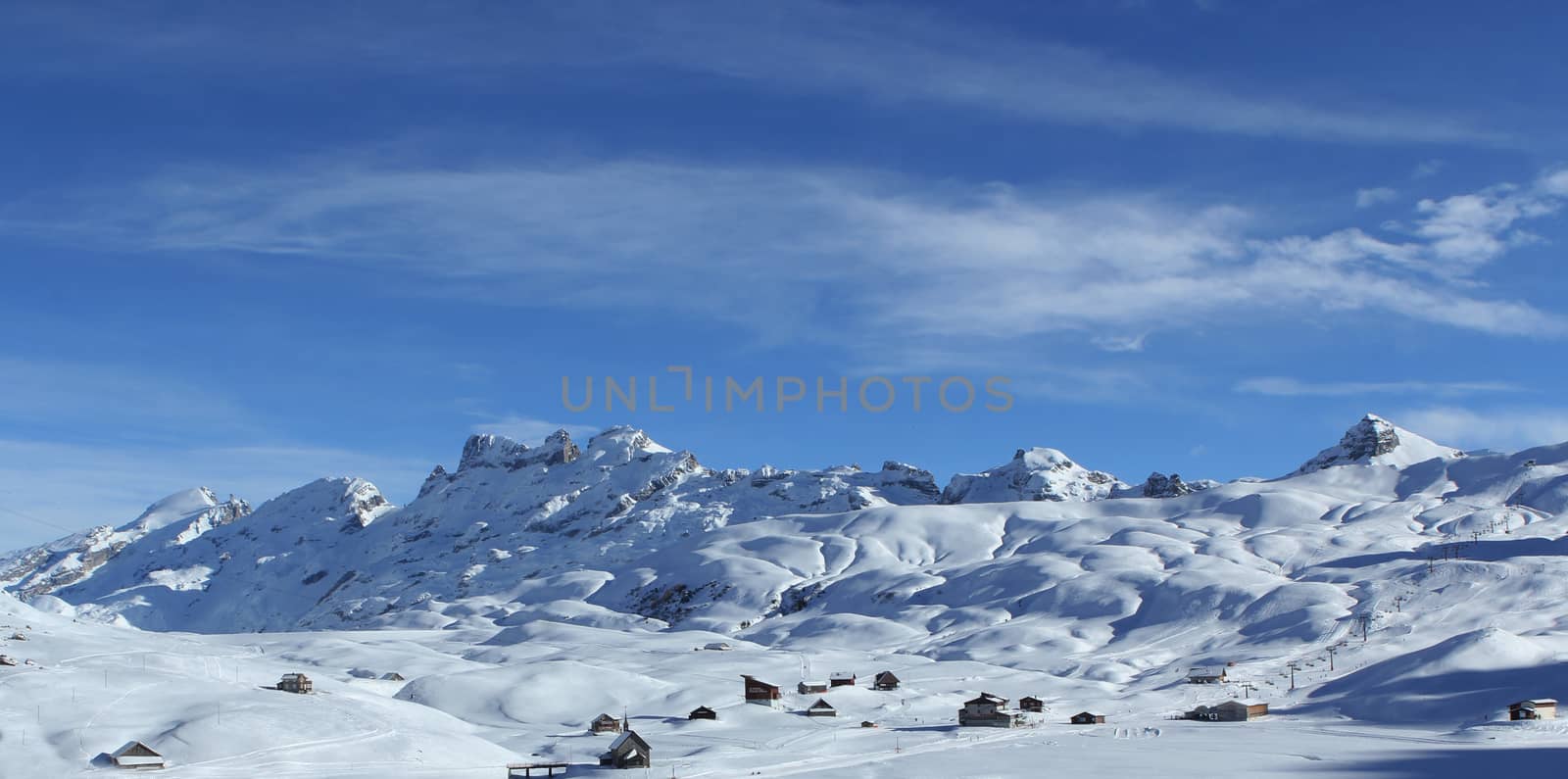 mountain range with blue sky in Melchesee Frutt, Switzerland with blue sky