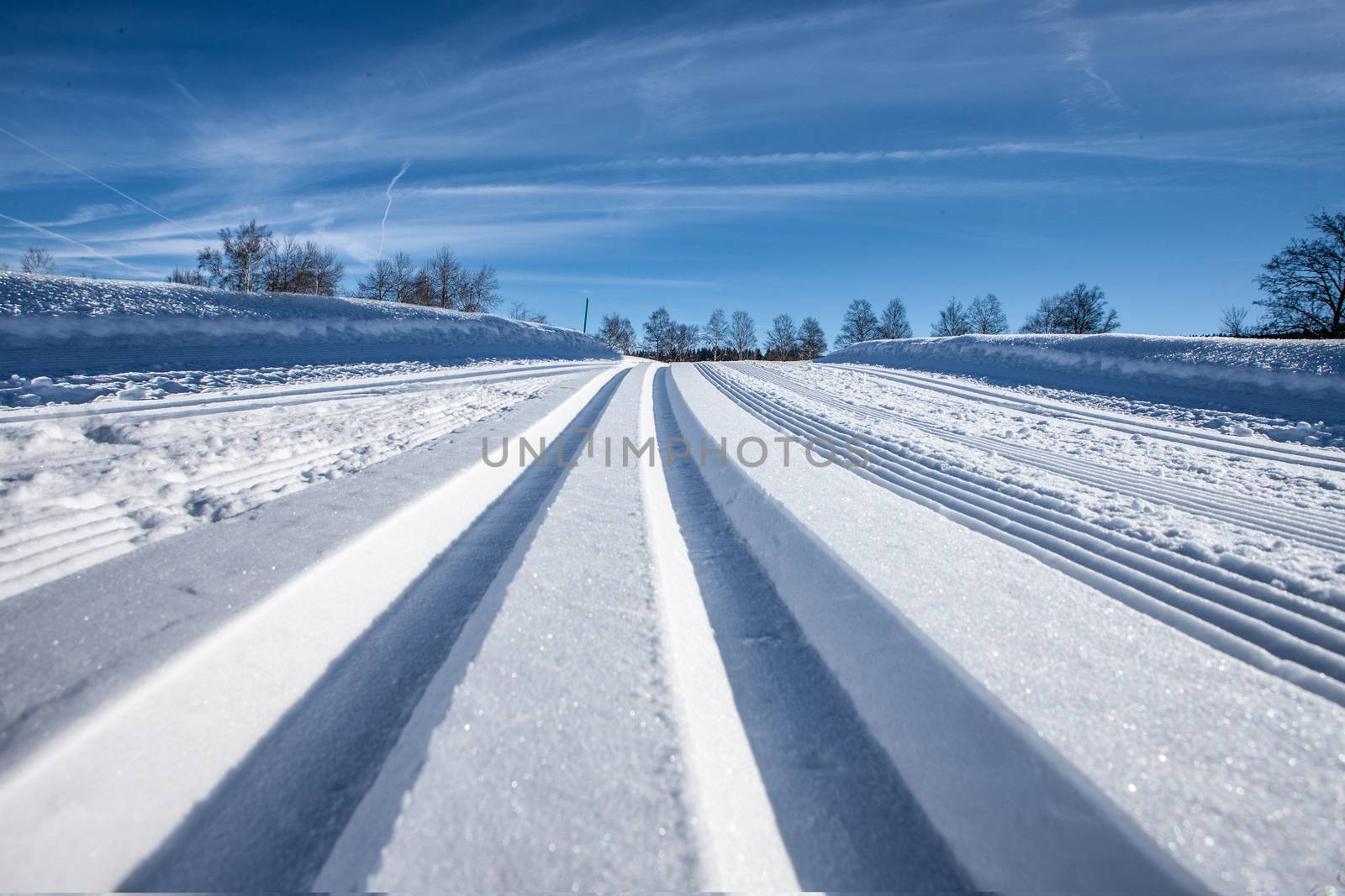 cross country tracks in snow on Zugerbeg switzerland. Clean tracks in Snow