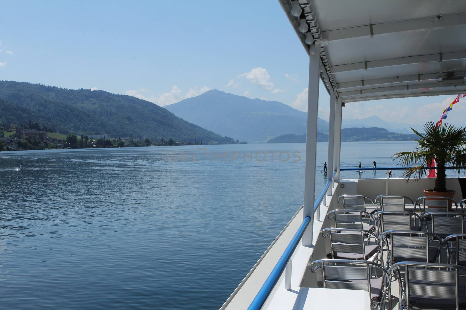 boat on lake zug with Rigi and lake by PeterHofstetter