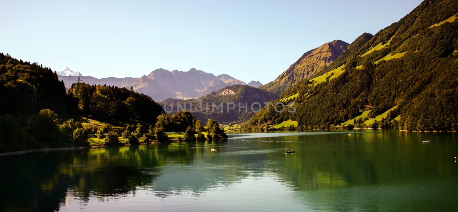 lake lungern Switzerland - famous fishing lake in Switzerland. Reflection in water