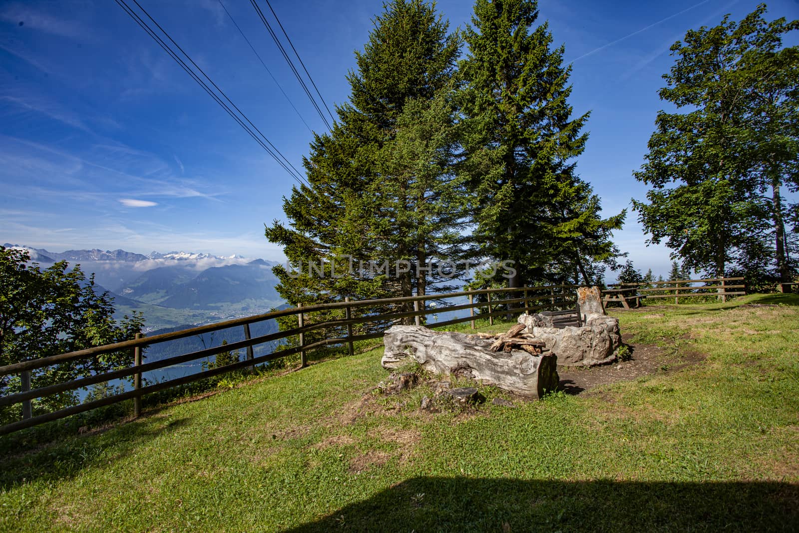 Swiss Alps landscape up in rigi Kaltbad, with trees, mountains and blue sky