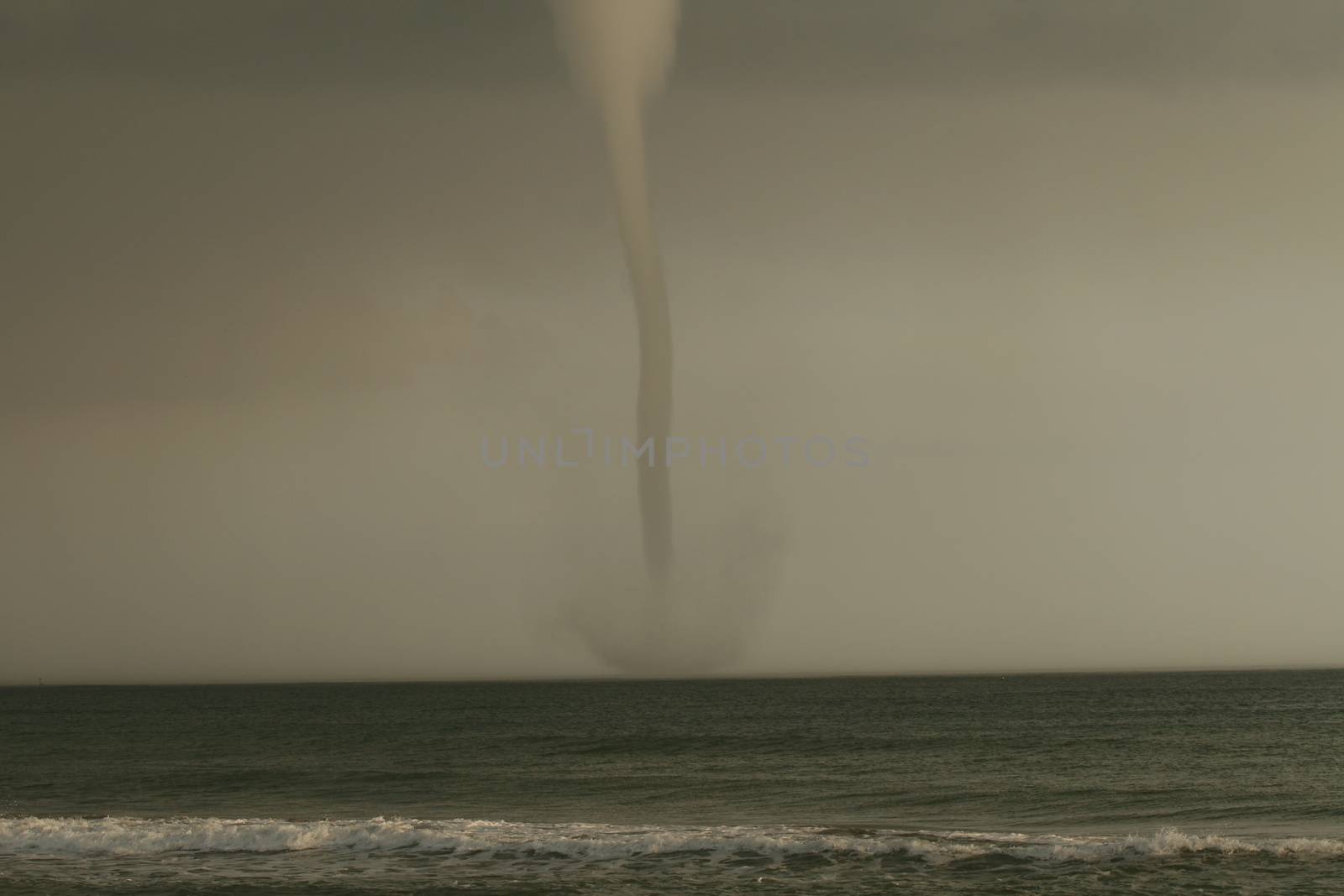 bad weather and storm with the wind on the sea. tornado over Barcelona by PeterHofstetter