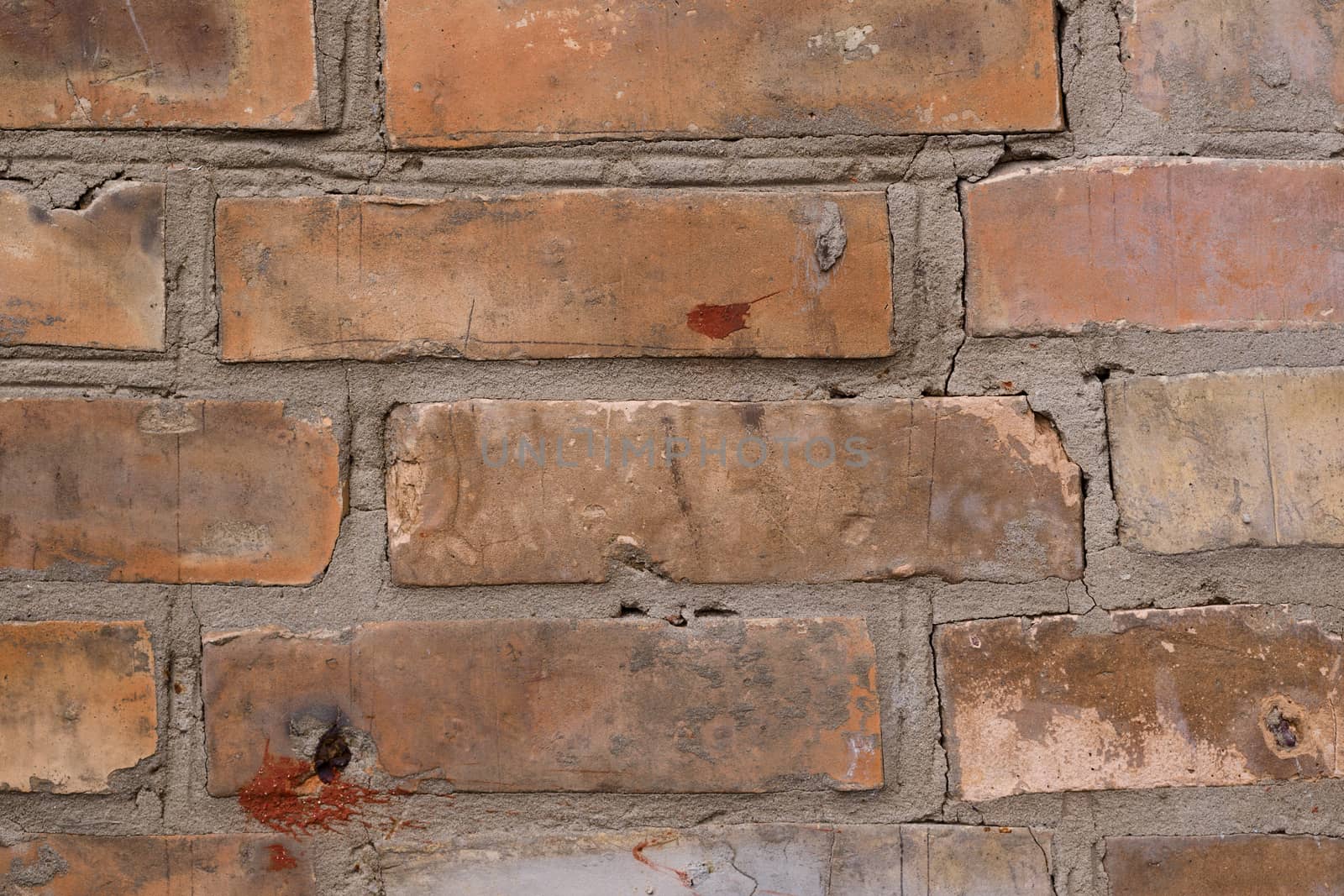 Old orange brick wall pattern. Brick background. Good wallpaper. Stock photo of old wall.