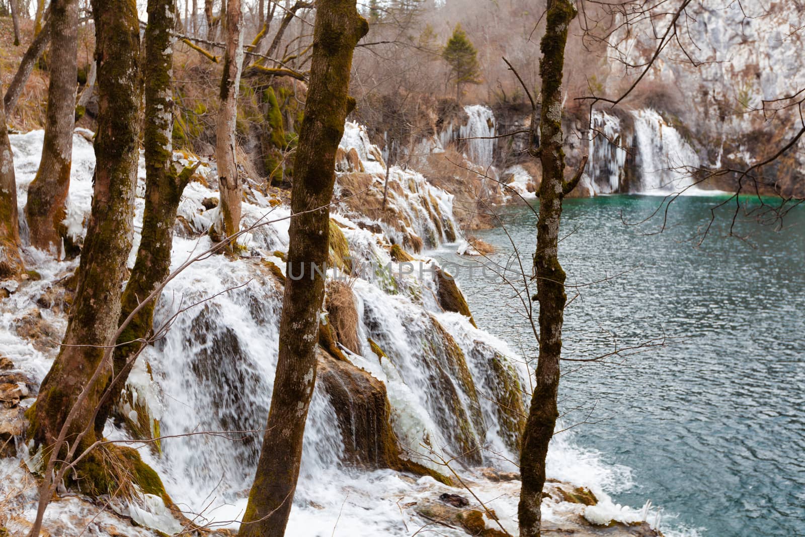 Plitvice Lakes National Park in winter, water going through forest