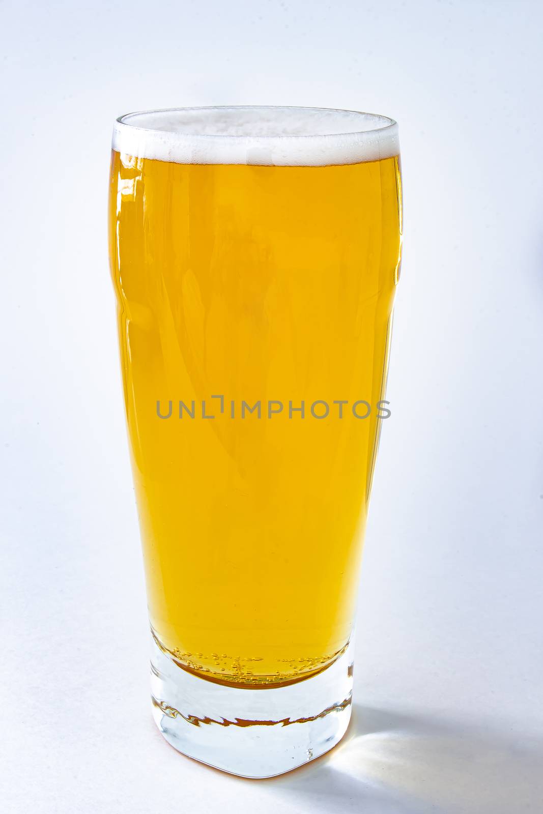 An isolated Bavaria beer pint on a white background by oasisamuel