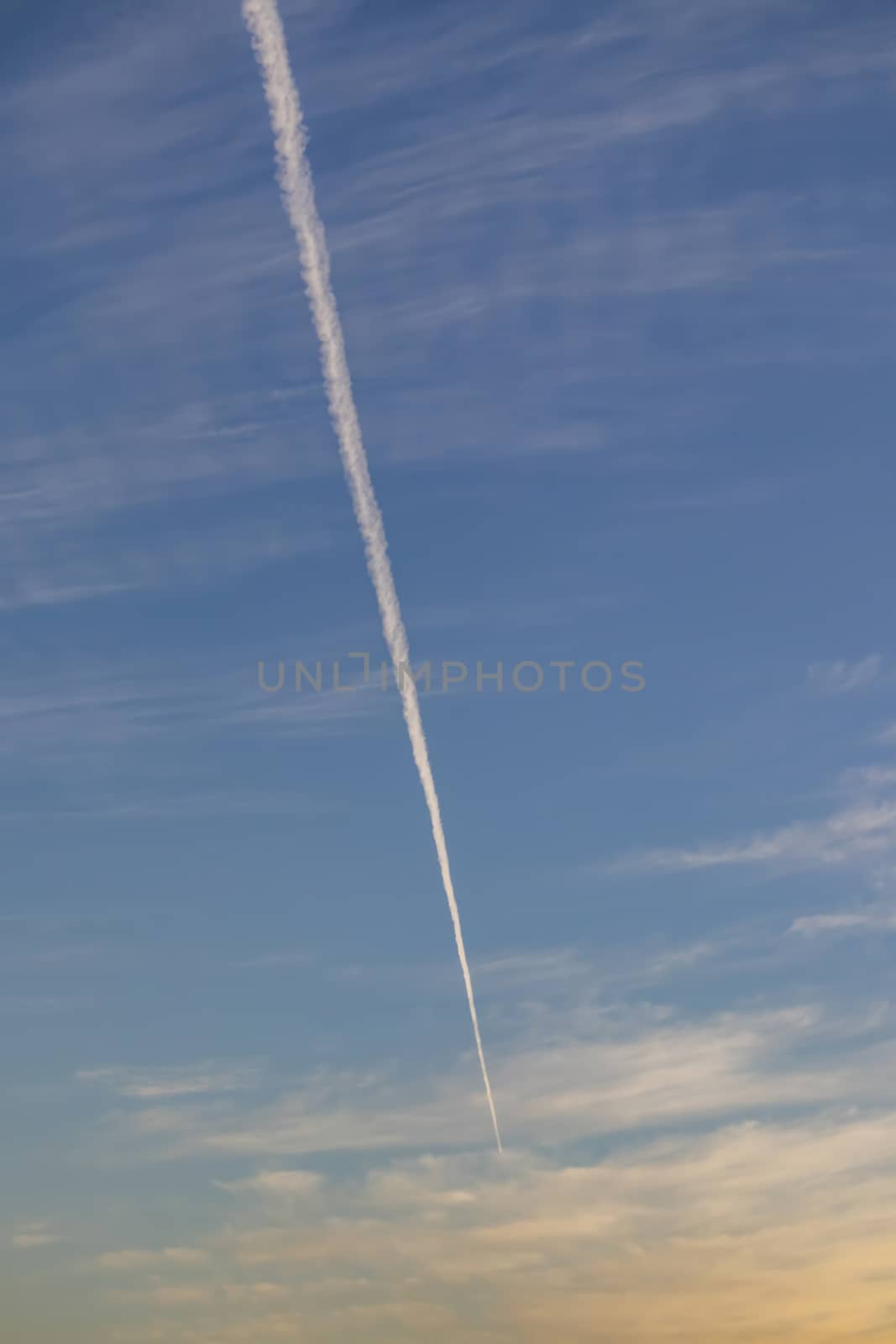 jet fuel trail left by planes at the sky by yilmazsavaskandag