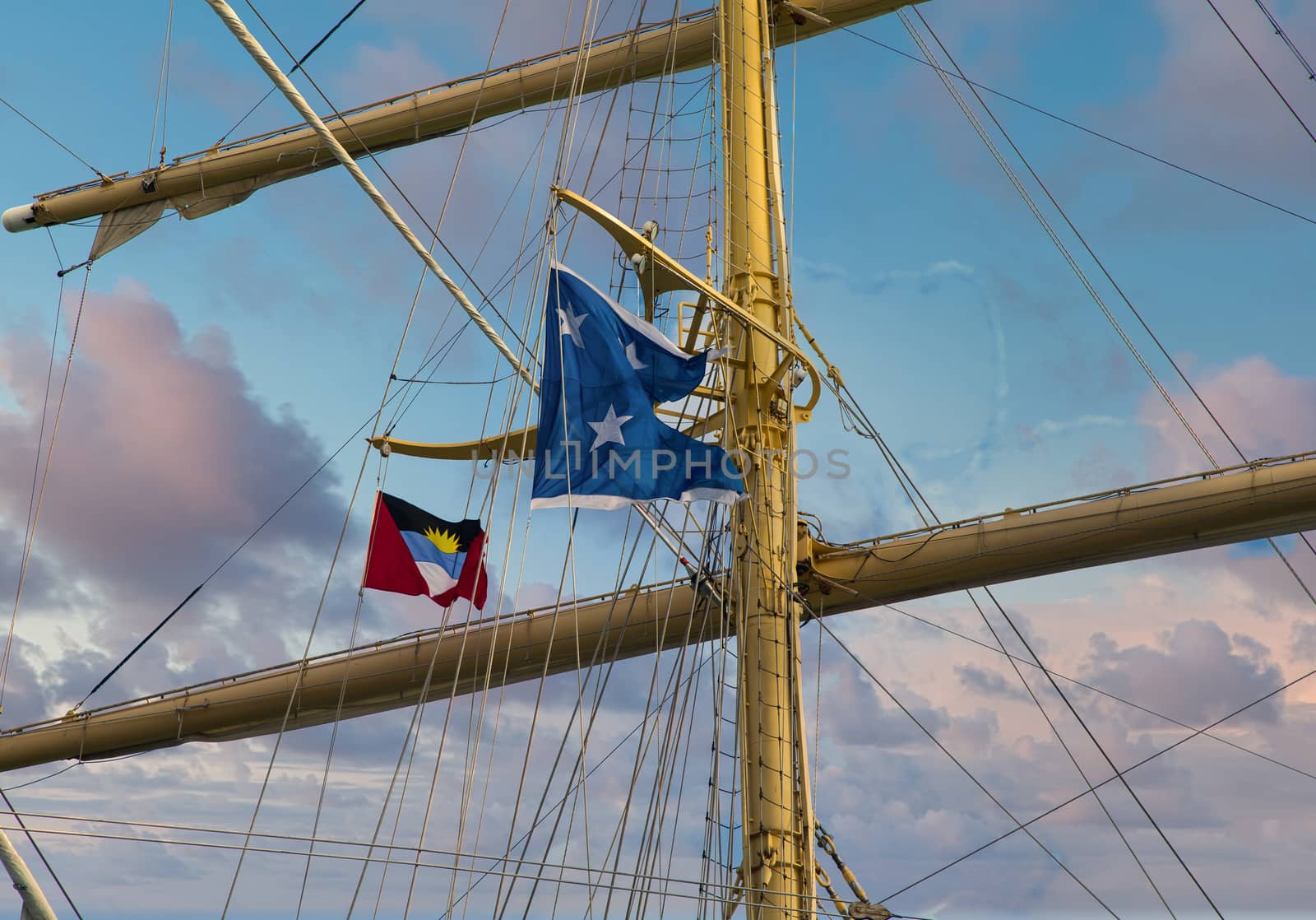 Clipper Mast with Antigua Flag at Dusk by dbvirago