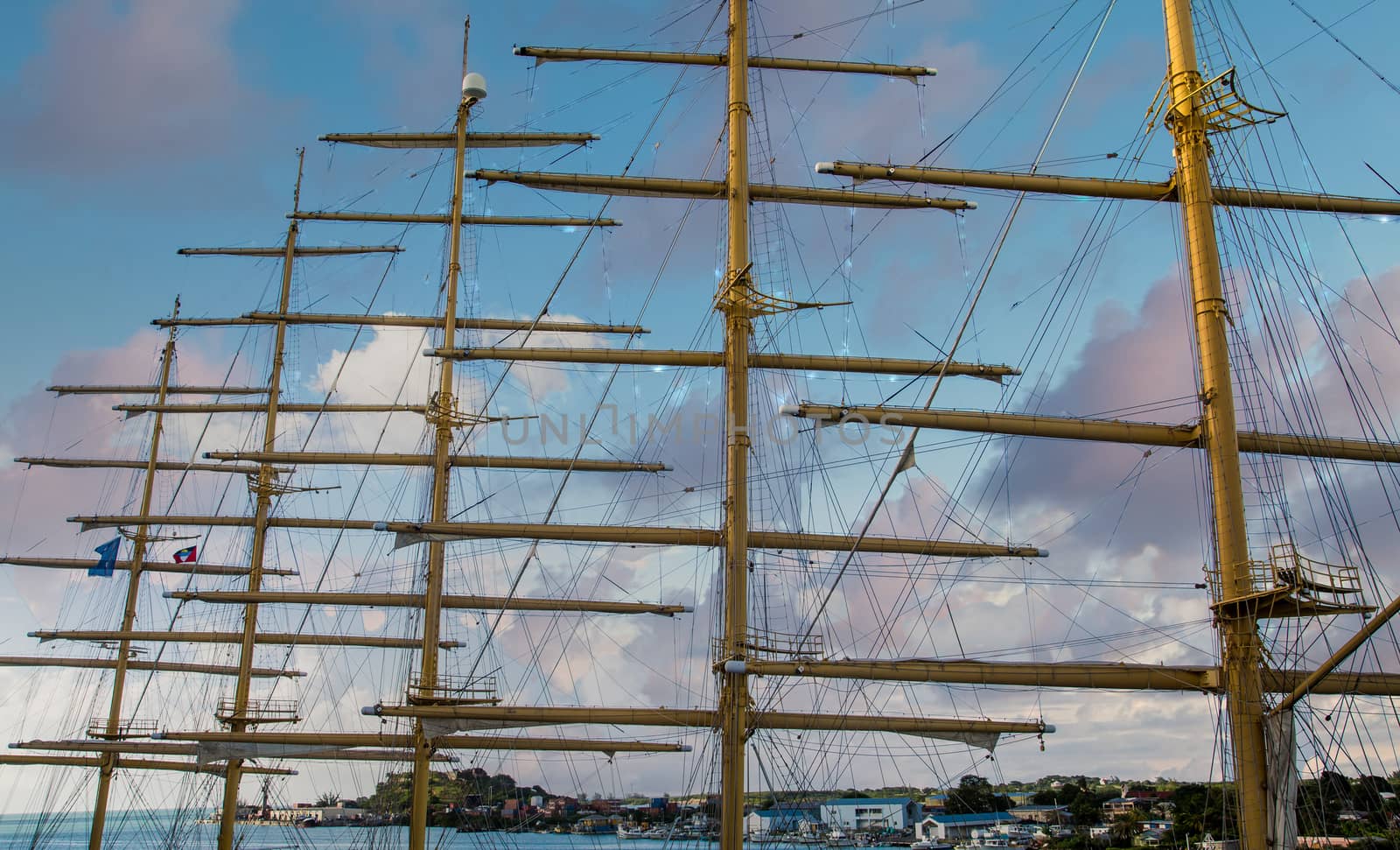 Wood masts of an old clipper ship against a nice sky