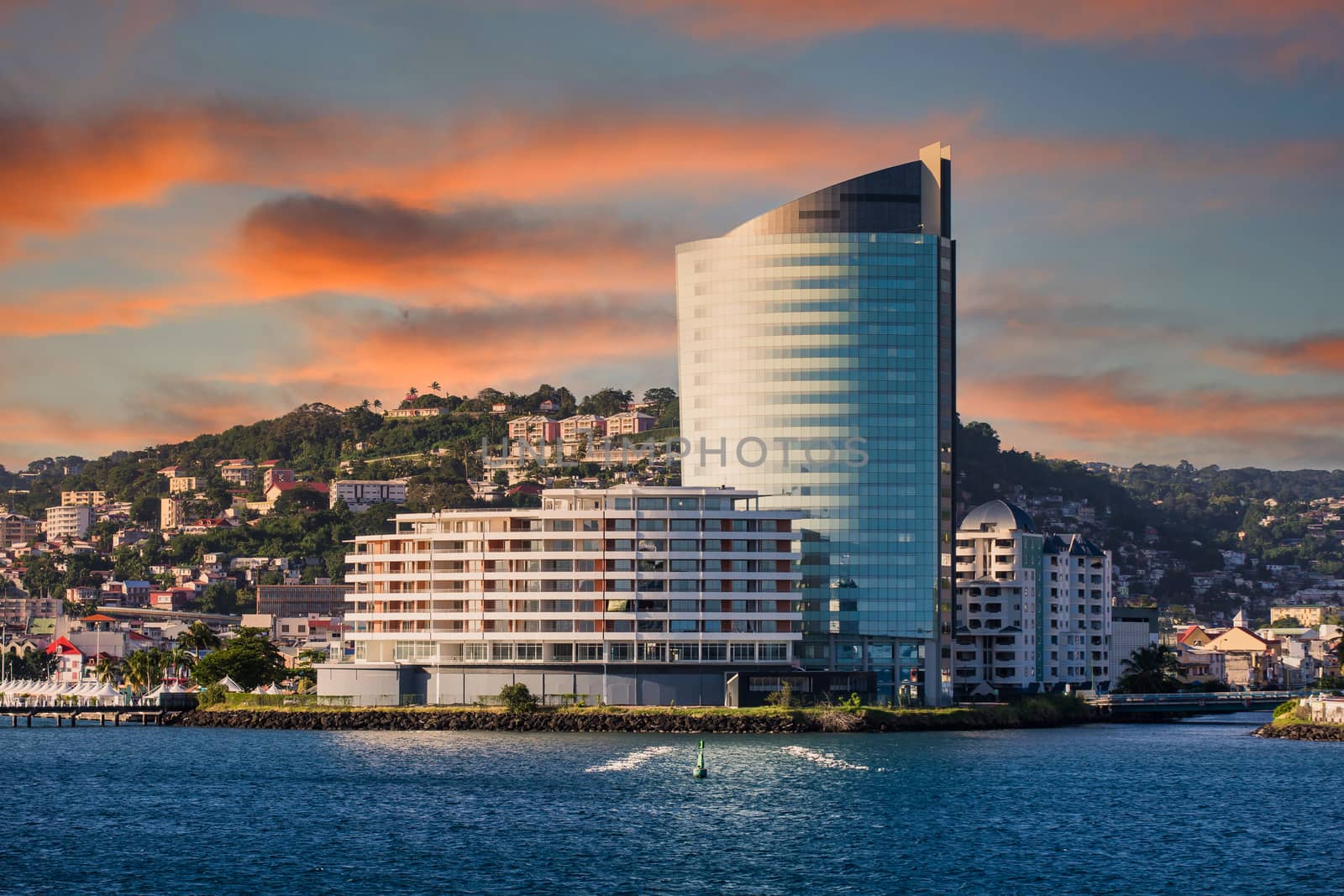 Modern Blue Glass Resort on Martinique at Dusk by dbvirago