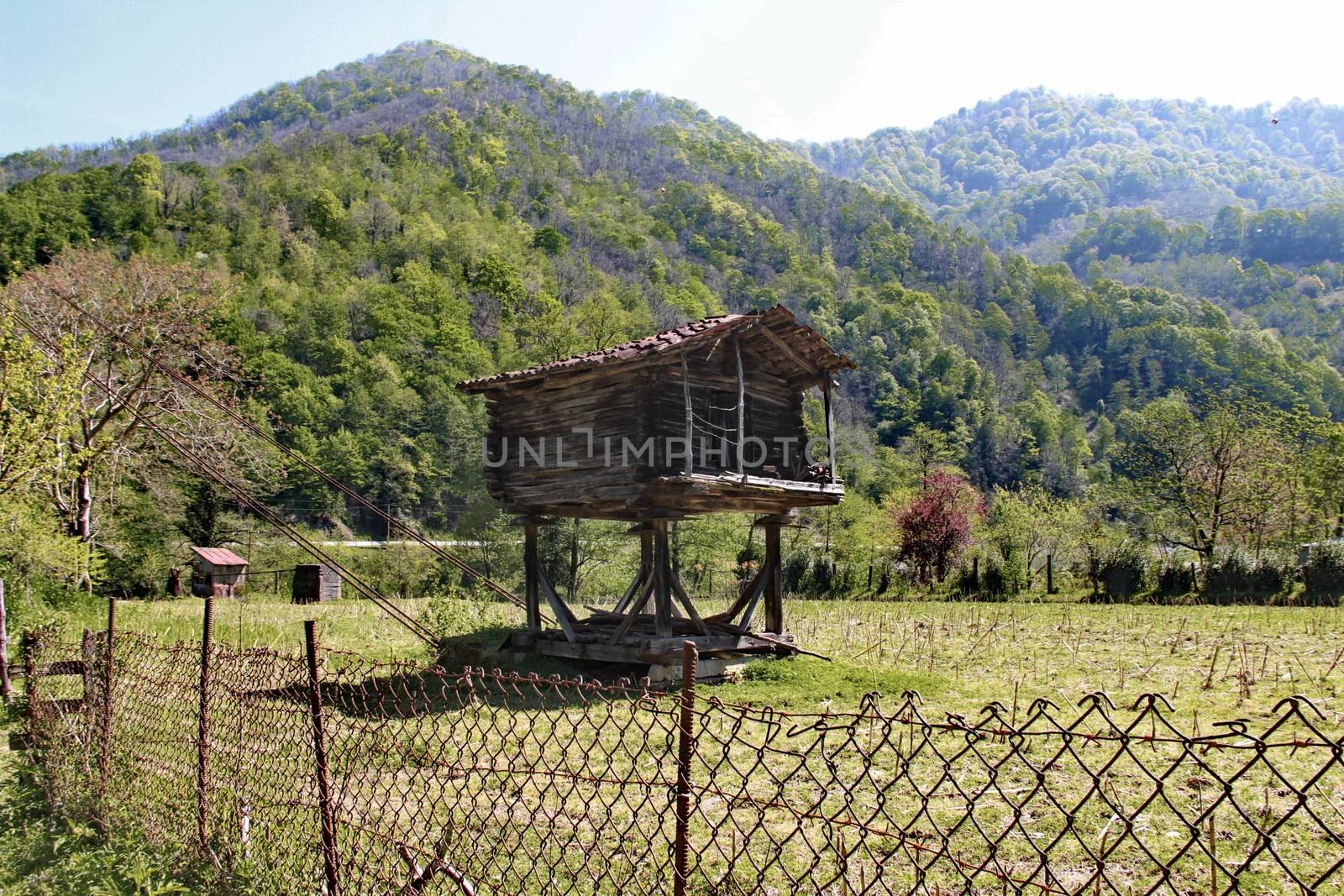 A construction for storing crops in a village in Georgia, made to protect the crop from bears and rodents