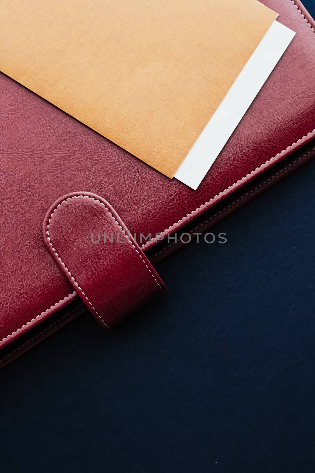 Office desk with briefcase and business card, finance and economy concept