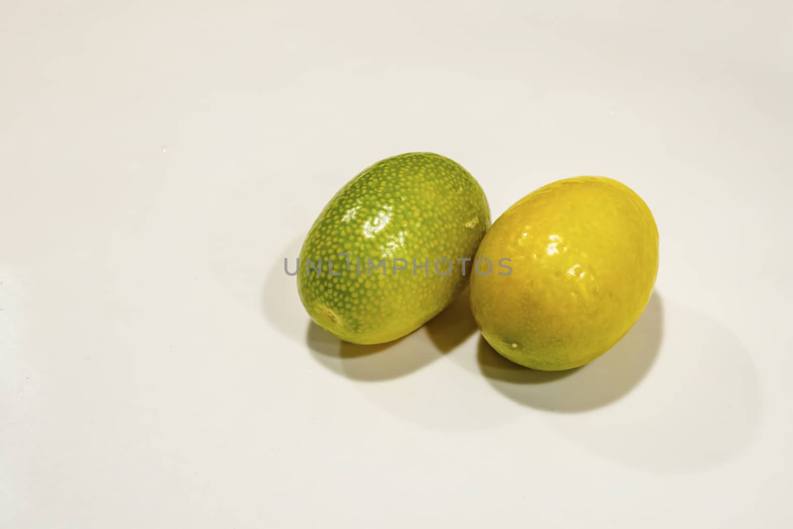 close up kumquat fruits on background