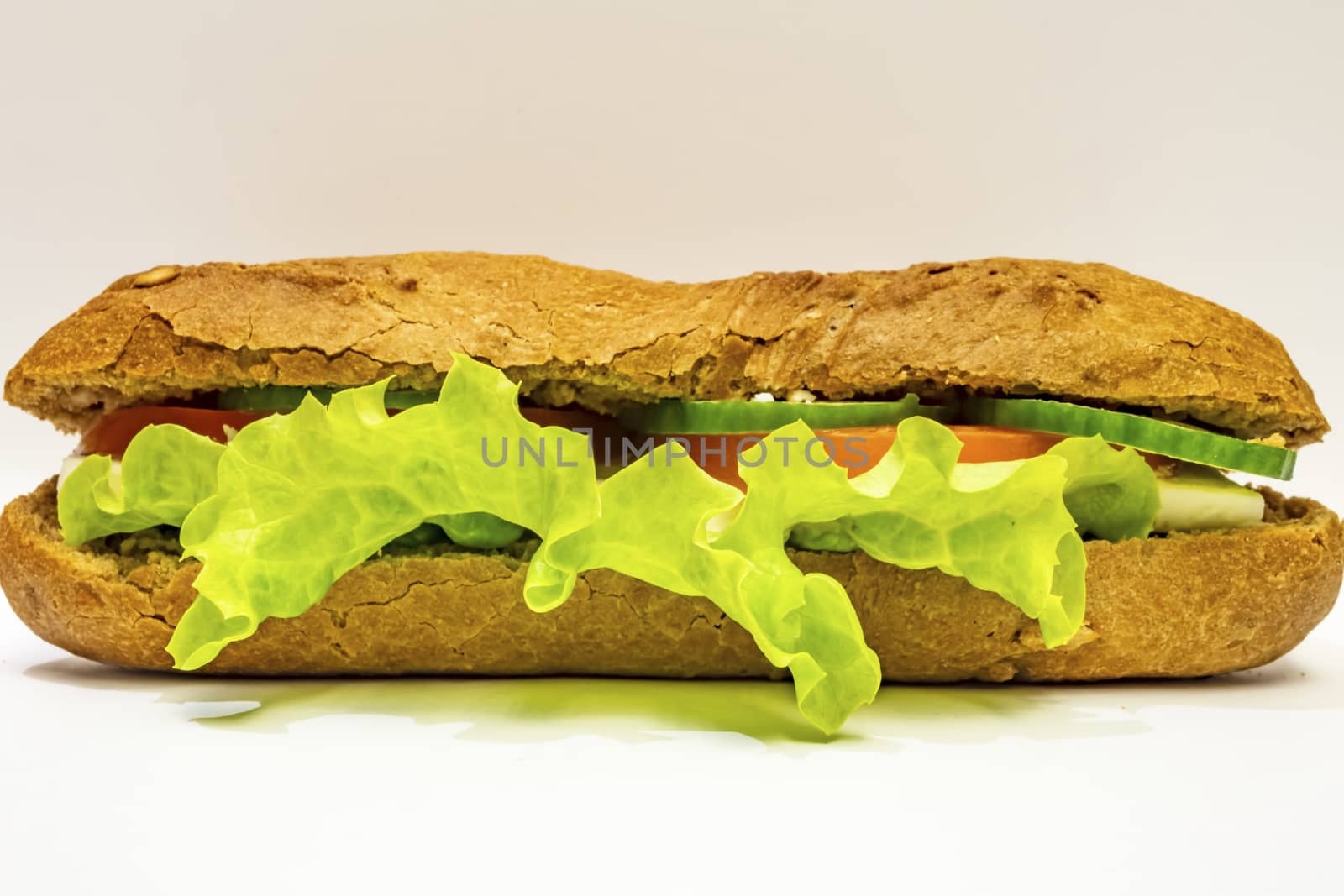 ready to eat sandwich with lettuce,cheese, sliced tomatoes and cucumber