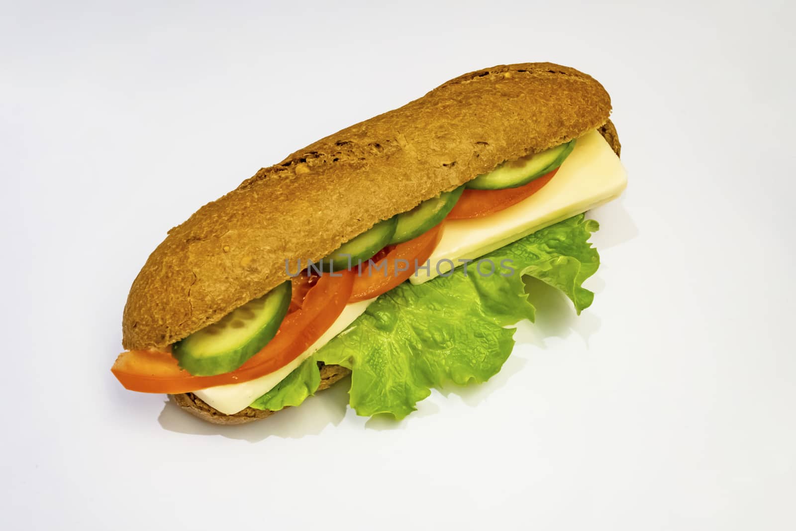 ready to eat sandwich with lettuce,cheese, sliced tomatoes and cucumber