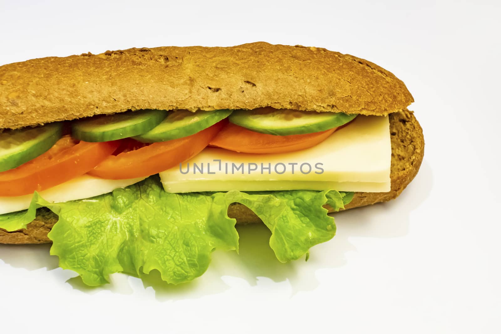 ready to eat sandwich with lettuce,cheese, sliced tomatoes and cucumber
