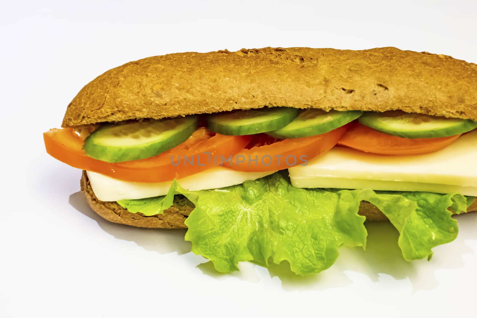 ready to eat sandwich with lettuce,cheese, sliced tomatoes and cucumber