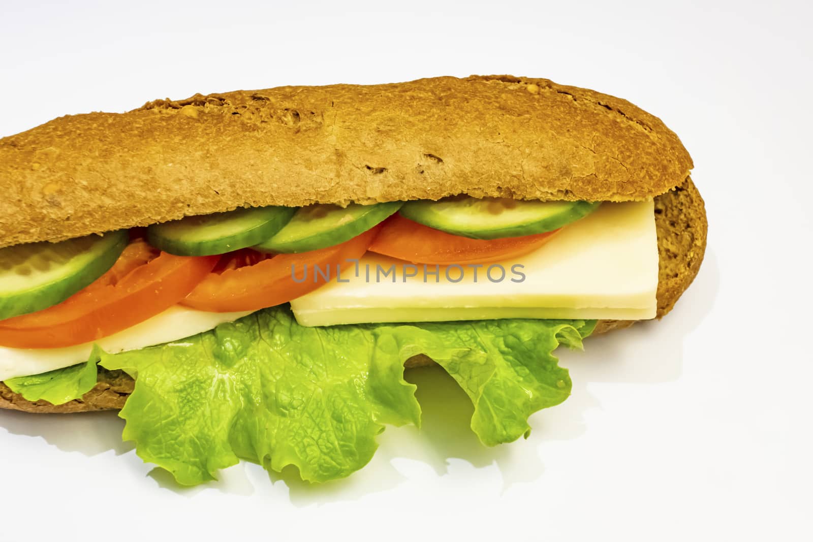 ready to eat sandwich with lettuce,cheese, sliced tomatoes and cucumber