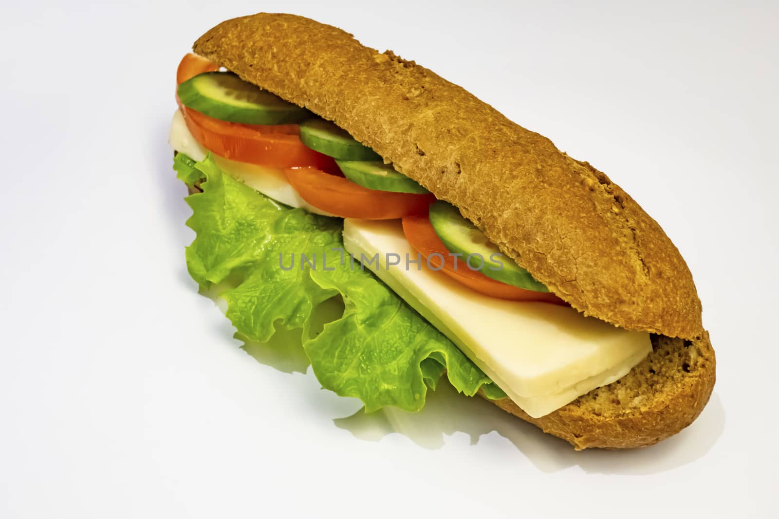 ready to eat sandwich with lettuce,cheese, sliced tomatoes and cucumber