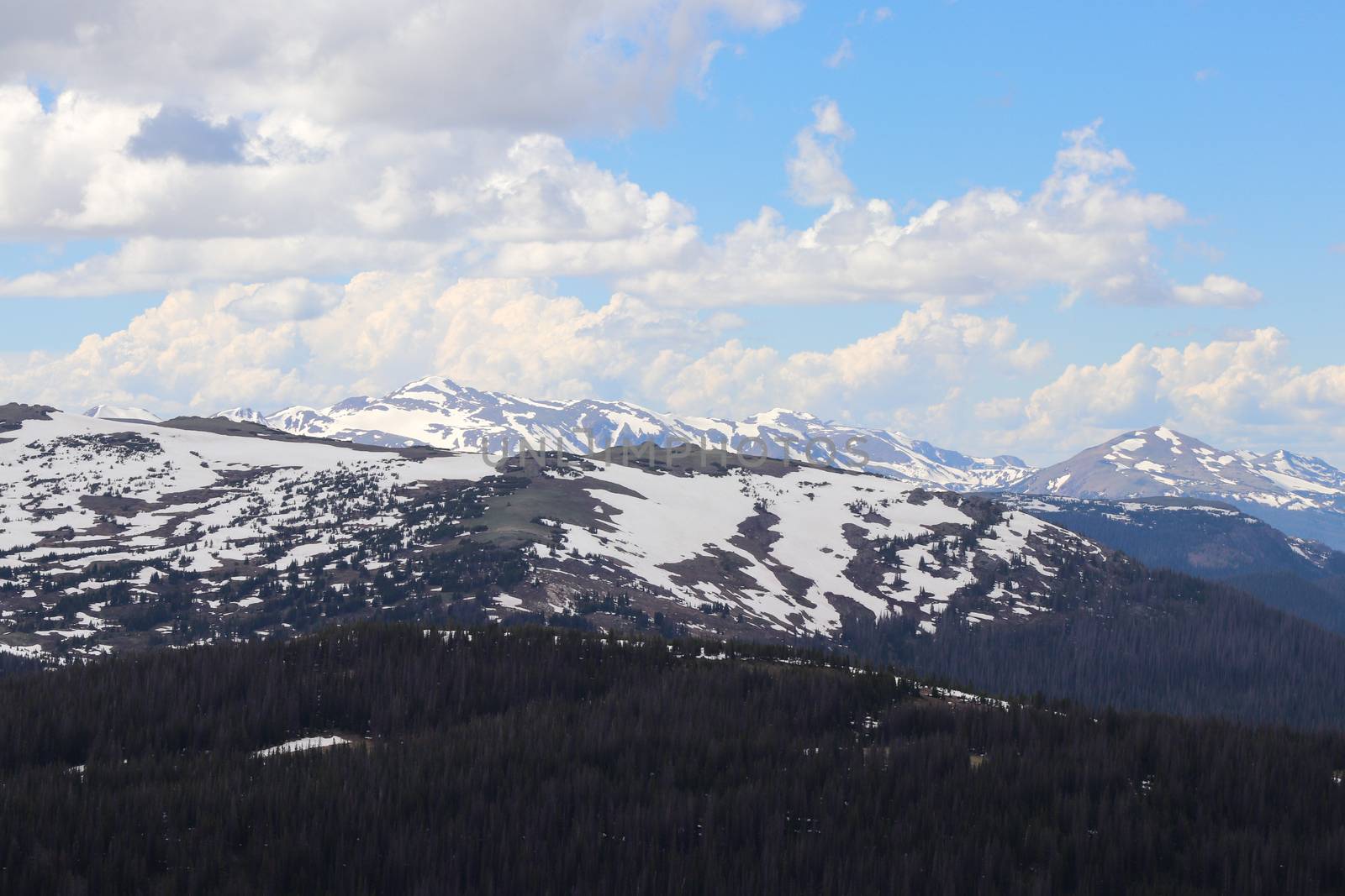 The Colorado mountain snowy covered peaks summer 2019 by gena_wells