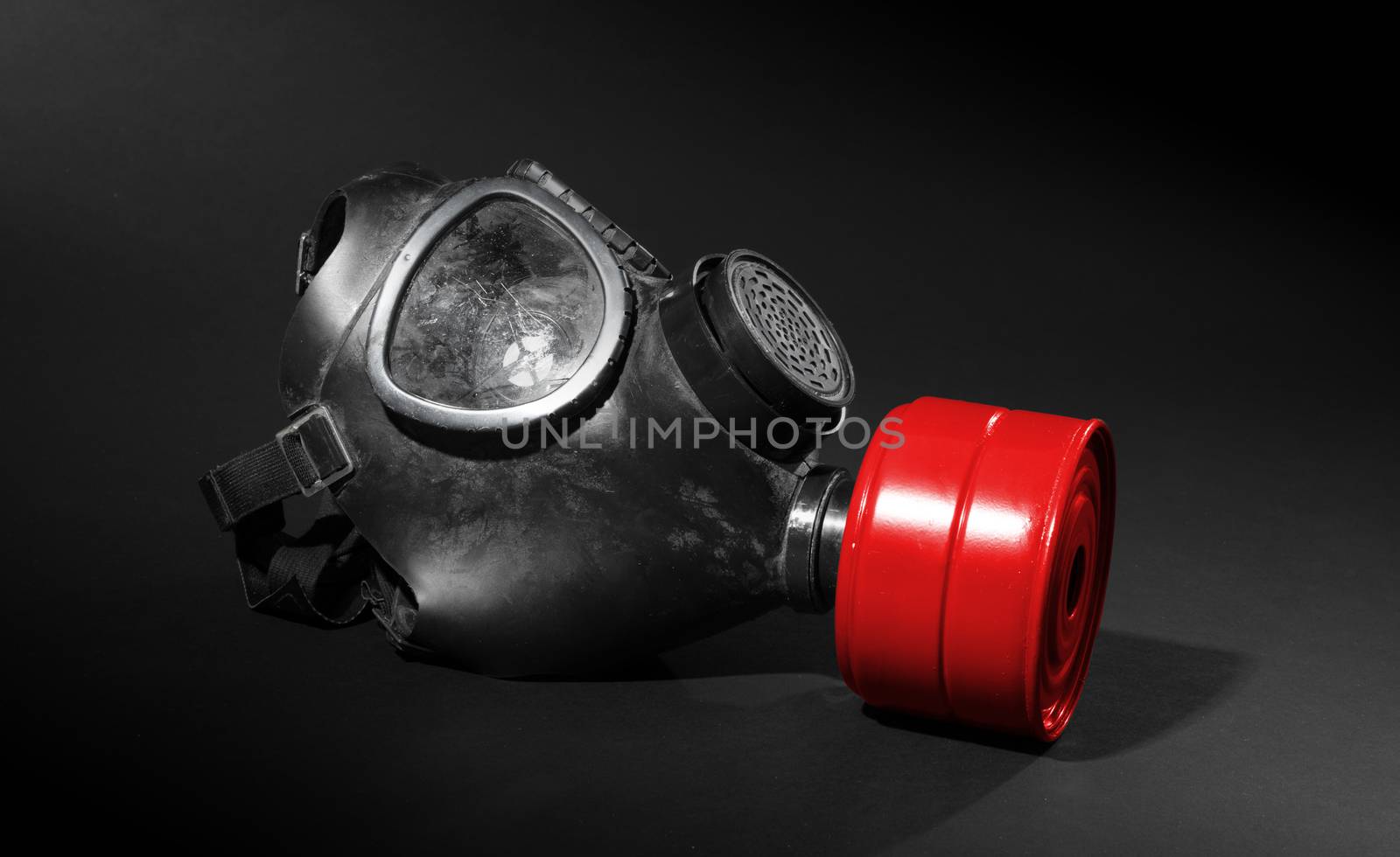Vintage gasmask isolated on black background - Red filter