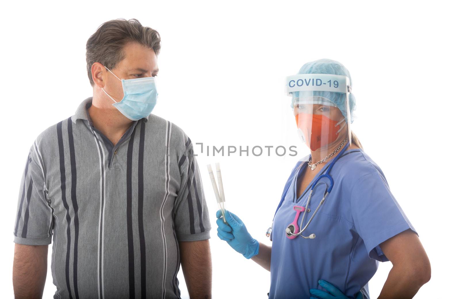 Healthcare professional holding a COVID-19 coronavirus viral flu swab test for patient